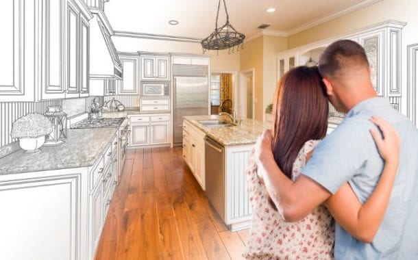 couple-looking-at-kitchen-remodel