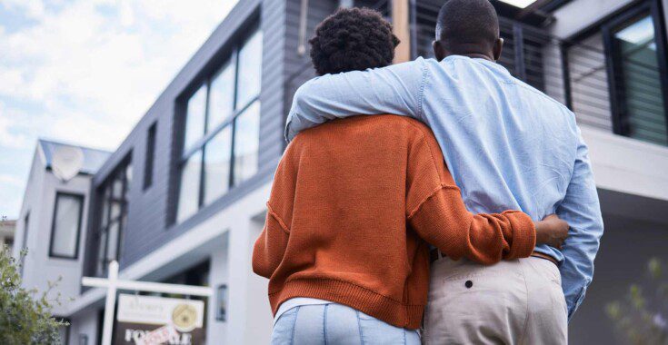 Young couple looks at new house